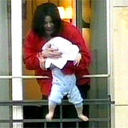 Michael Jackson dangles baby from hotel balcony Michael Jackson dangles baby from hotel balcony